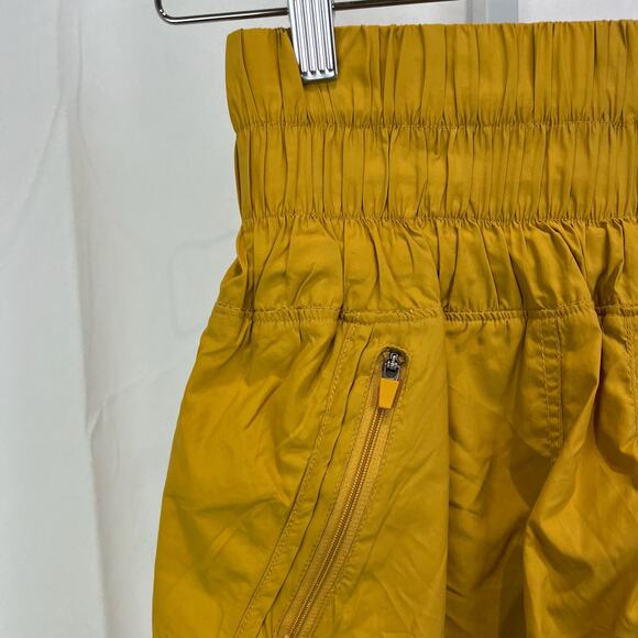 FREE PEOPLE Movement S The Way Home Shorts Smocked Waist Mustard Yellow Gold - Picture 4 of 10